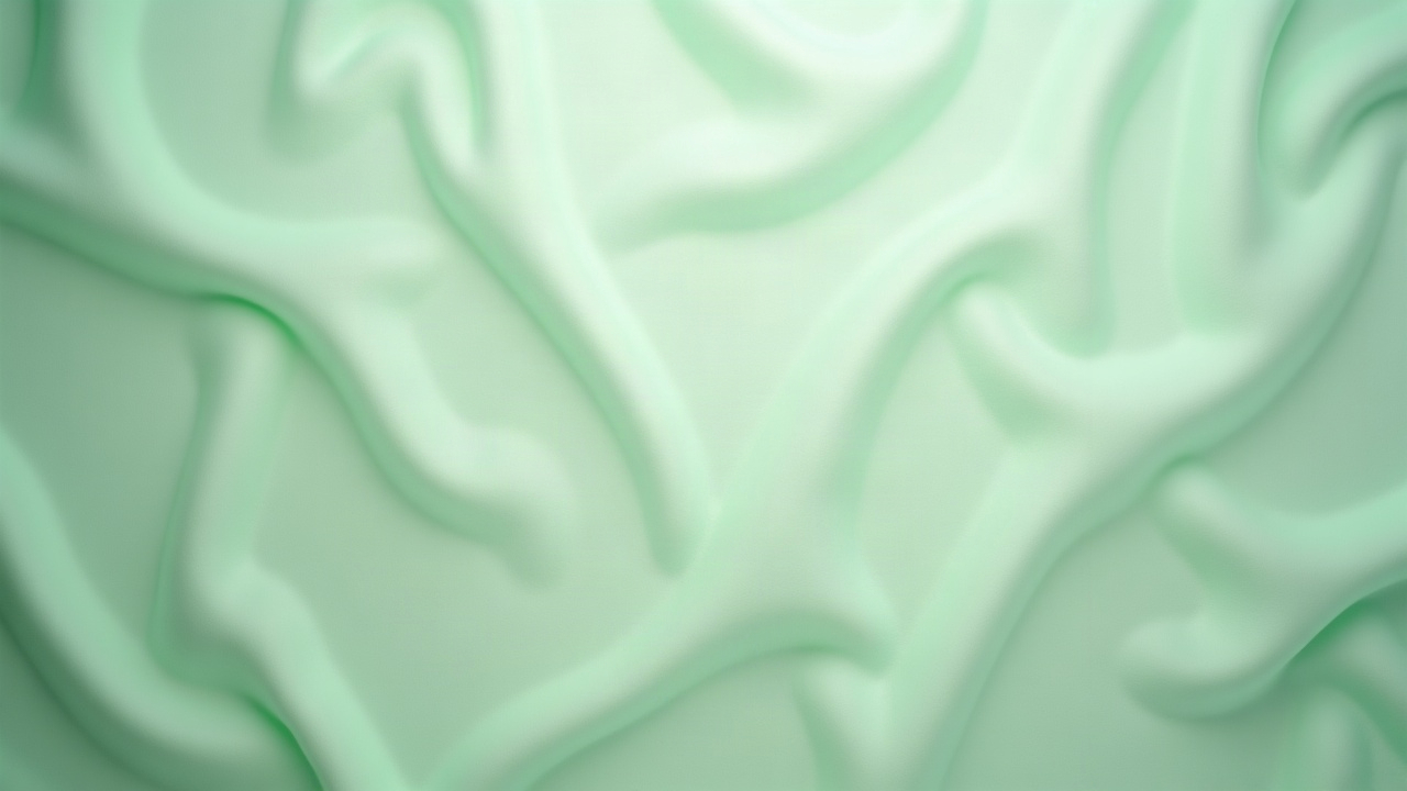 Vista cenital de un paño verde de textura fina iluminado suavemente